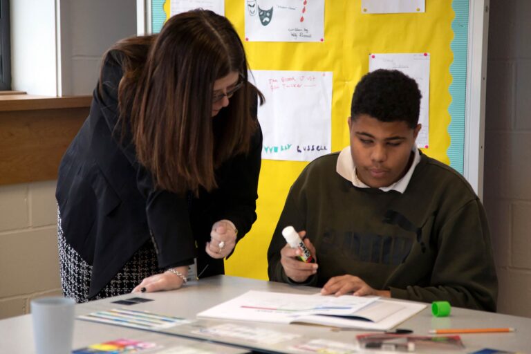 Teacher with Learner on International Day of Education 2023